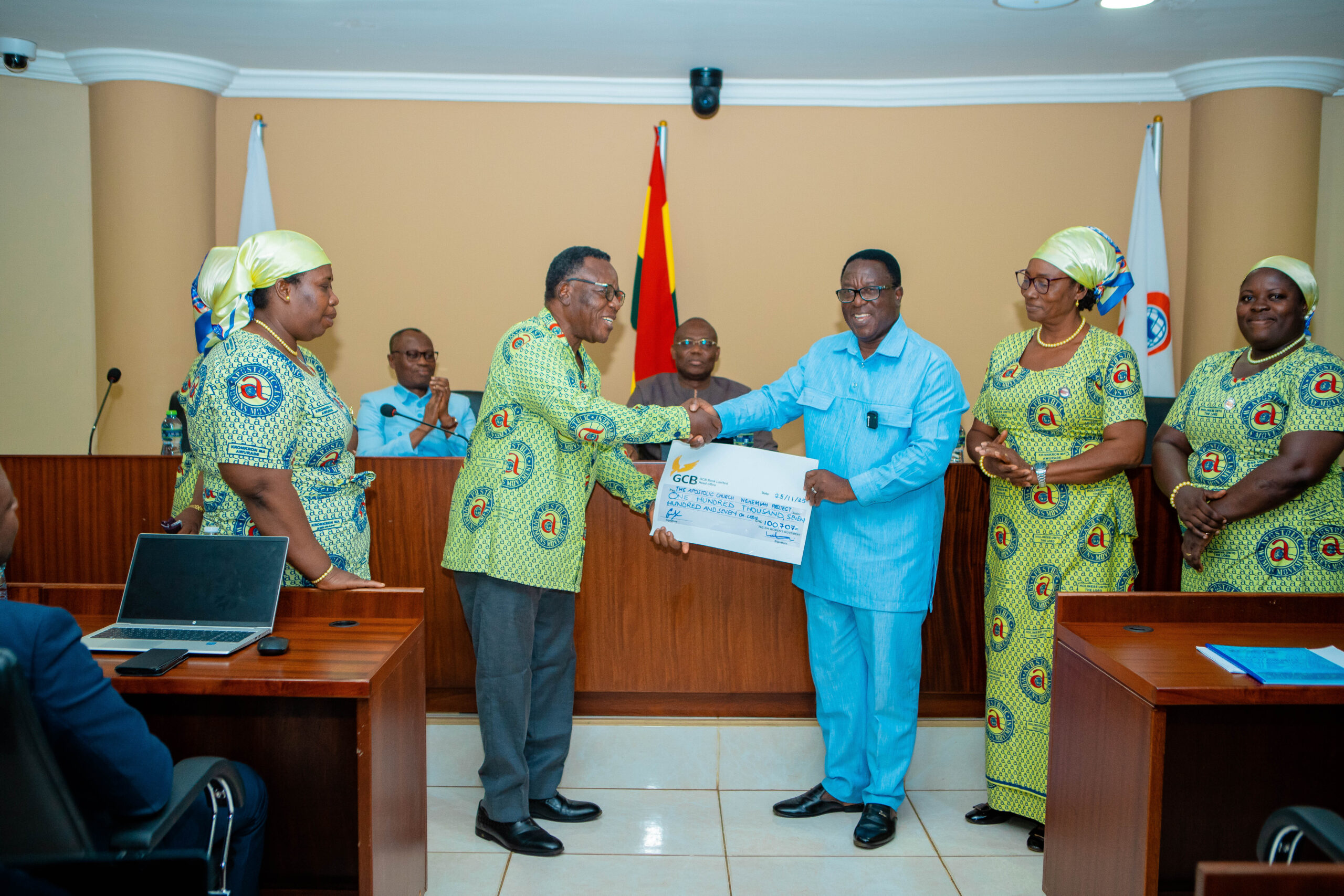 The General Secretary receiving the donation on behalf of Management