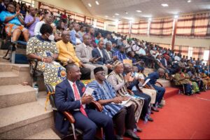 ELD. KWESI SEATED WITH CO-AUTHOR AND OTHER INVITED GUEST